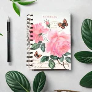 Redouté Rose B6 notebook with pink rose and butterfly design, spiral bound with lined pages.