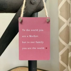 Pink mini metal sign with “To the world you are a Mother” quote and jute string.