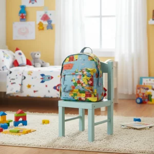 Small children’s backpack featuring a colourful world map design with red straps and a front pocket.