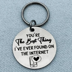 Round stainless steel keyring engraved with “You’re the best thing I’ve ever found on the internet” with phone and heart design.