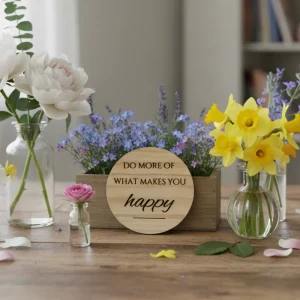 Round wooden coaster engraved with motivational quote – Do more of what makes you happy