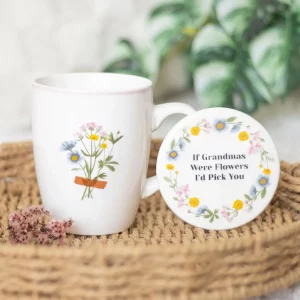 Mug and coaster set styled in a woven tray with flowers