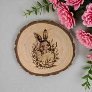 Woodland rabbit engraved log coaster with floral detail