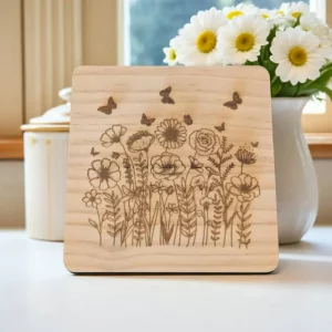 Wildflower engraved wooden coaster with butterfly detail